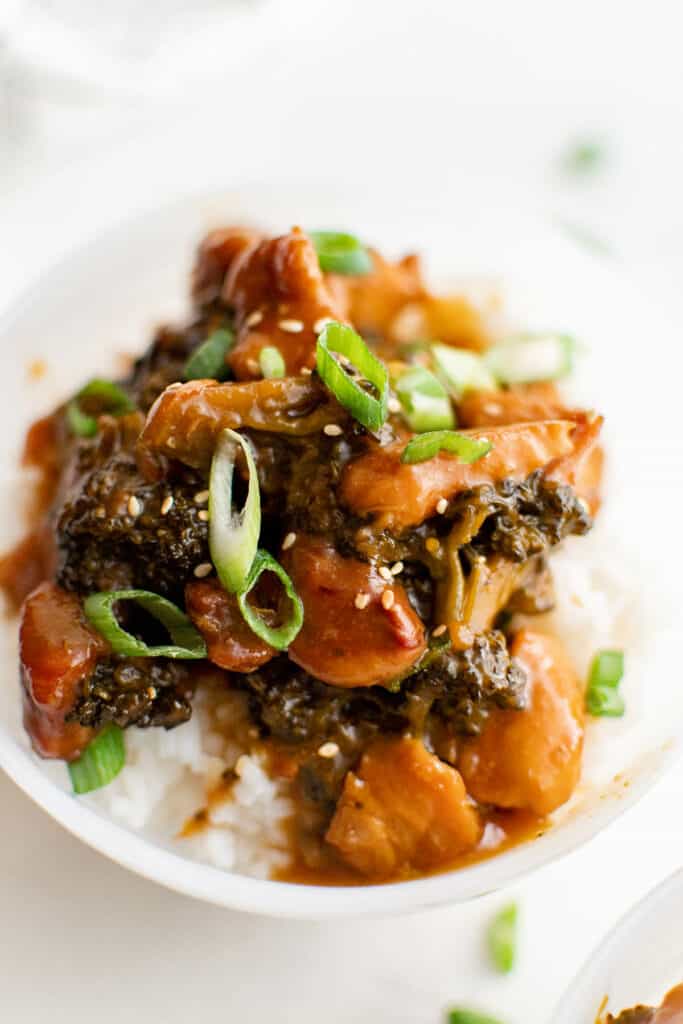 apricot chicken in a bowl with rice