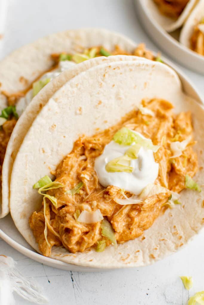 crockpot queso chicken in taco shells