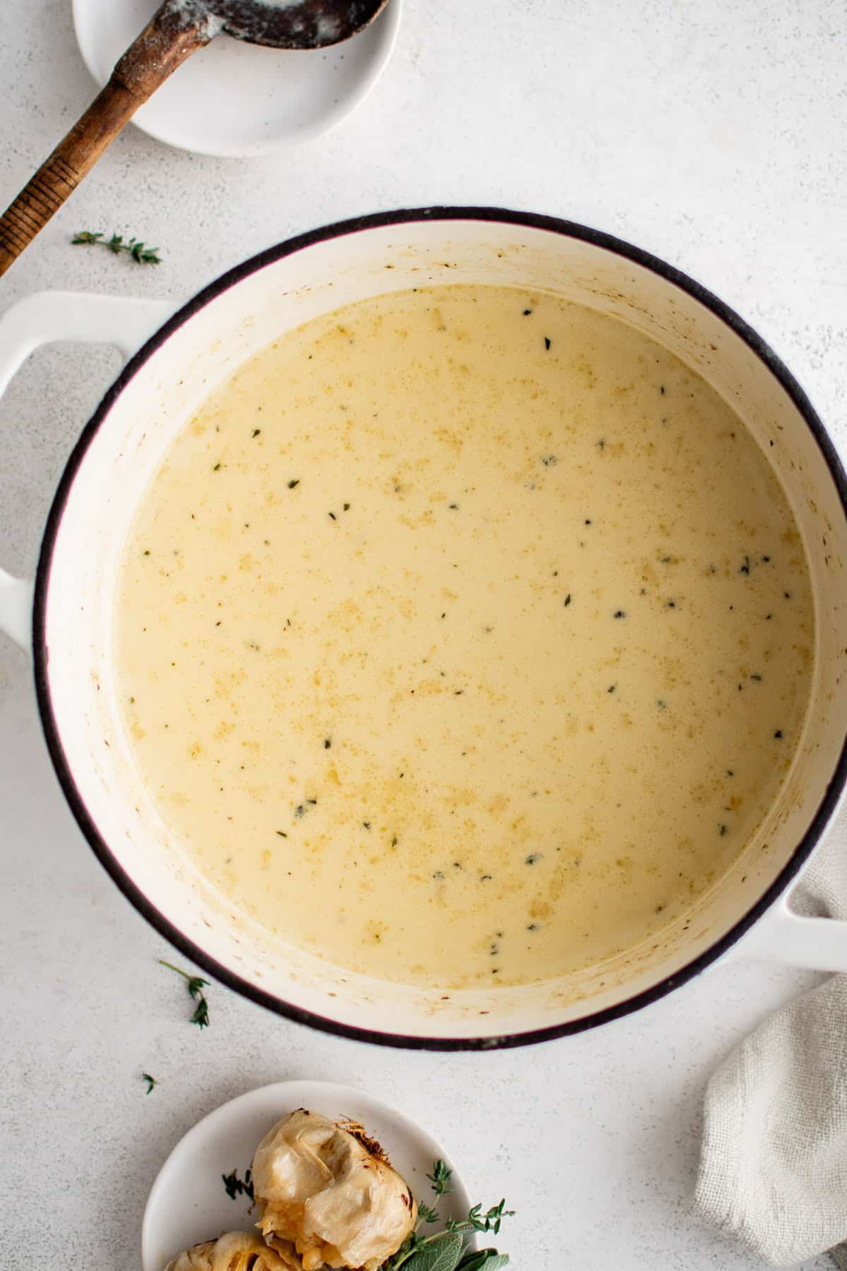 roasted garlic soup in a pot
